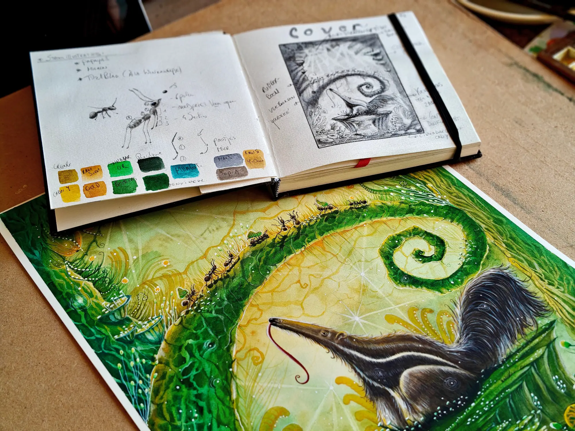 Schetsboek en handgeschilderde illustratie
